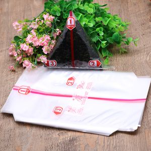 Sushi Tools 100pcs Triangular Rice Ball Packaging Bag Nori Seaweed Onigiri Plastic Bags Easy Tear Portable Bento Accessories 230922