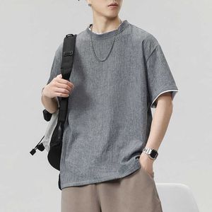 Camiseta de manga corta para hombre, nueva marca de moda INS, camiseta versátil fina de lino y algodón de dos piezas falsas para hombre
