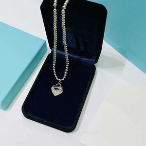 Tiffanyany Luxury Designer Colliers de pendentif populaire bijoux Stars Simple Moon Lover Femmes and Man Alloy Heart Long Heart Round Collier Festival Best Gift with Box