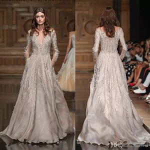 Tony Ward Latest Prom Dresses Luxury Feather Long Sleeve Beads Dress Evening Wear Sheer V Neck Crystal Sweep Train Custom Made Party Gowns
