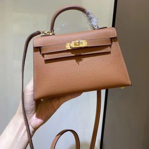 Top Bolso de diseñador para mujer Bolso de mano marrón de 28 cm Bolso bandolera de lujo Bolso bandolera de cuero de vaca Bolso de mano de moda Bolso de lichi de grano entero