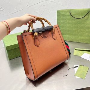 Totes Bolsos de diseñador de lujo Bolso de mano Bolsos cruzados Bolso de mujer de diseñador Bolso de compras Mango de bambú Moda Cuero genuino en el bolso de mano Bolsos de dama Dhgate Bolso de nylon