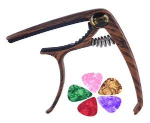 Capo de guitarra de aleación de zinc de grano Capos de gravámenes de gravámenes con clavos de cuerda Pull 6pcs Guitar Picks6031217