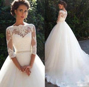 Vestidos de novia ALine de encaje vintage, cuello alto transparente con media manga larga, faja de perlas, vestidos de novia baratos hechos a medida de princesa P7547675