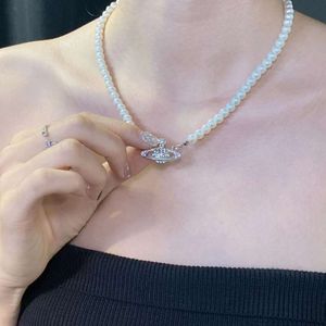 Viviennes Westwoods Collar de perlas blancas de arroz perla Collar apilado popular Cadena Collar de perlas de Saturno