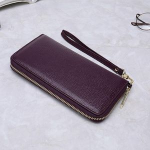 Carteras Cartera para mujer Cuero de vaca real Cuero genuino Monedero largo Titular de la tarjeta Dinero Teléfono Embrague Pulsera Cremallera alrededor de color púrpura sólido