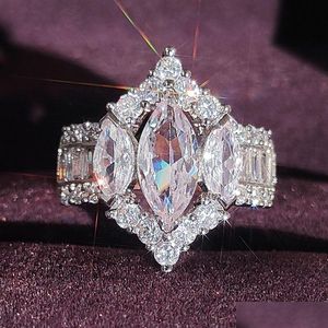 Anneaux de mariage 2023 Choucong Marque Bijoux de luxe 925 Sterling Sier Marquise Cut Blanc Topaz Cz Diamant Eternity Femmes Engagement Ban Dhbwp