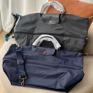 bolso de fin de semana equipaje de diseñador bolso de lona bolso de viaje bolso de viaje expandible Hombres Mujeres de gran capacidad de cuero de vaca bolso de equipaje de nailon impermeable de alta calidad