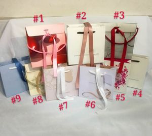 Accessoires de bricolage adaptés aux sacs cadeaux en papier sac en nylon breloques perles boucles d'oreilles boîtes à bagues Bracelet collier bijoux emballage affichage