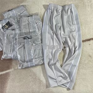 Pantalones de chándal con rayas blancas Hombres Mujeres 1 Pantalones de chándal bordados de alta calidad