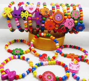 Whole-60pcs Niños Niñas Pulseras de madera Muñequeras para niños 12 diseños Mezcla Todo el regalo de la fiesta de cumpleaños Joyas Lot260o