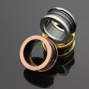 Venta al por mayor-316L Anillo de engranaje de oro rosa chapado en acero de titanio para parejas Joyería de anillo de cerámica negra / blanca
