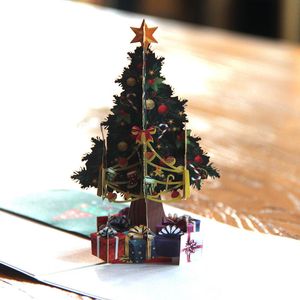 Venta al por mayor Tarjeta de felicitación emergente de Navidad Estéreo 3D Árbol de Navidad Postal hecha a mano Tarjetas de bendición creativas Regalo de aniversario de Año Nuevo