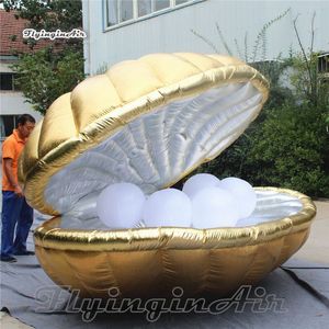 wholesale Concha de almeja inflable dorada personalizada Iluminación gigante Modelo de animal marino soplado por aire Globo de mejillón LED con perlas para decoración de bodas