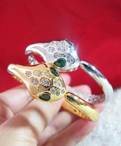 Al por mayor de alta calidad, ojos verdes, CZ, brazalete de diamante, diseñador de brazalete de bangle de cobre joyería de oro de 18 km plateado para mujeres2834555555