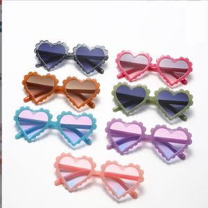 Venta al por mayor Estilo coreano Candy Heart Gafas de sol para niños Gafas de protección solar lindas Fiesta de moda Niñas Niños Gafas rosadas envío rápido