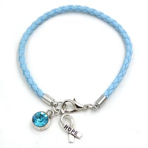 Bracelet de sensibilisation bleu clair en gros bijoux de cancer en cuir PU bracelets de charme de ruban d'espoir pour le cadeau de la Fondation du centre du cancer