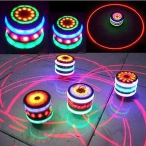 Venta al por mayor Magic Music Gyroscope Gyro Spinner Spinning Whirling Kids UFO Single Laser Colorful LED Peg-Top Toy Regalos de Navidad