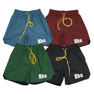 Wholesale men beach solid color loose polyester pocket rhude letter embroidery shorts