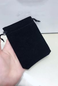 Material de embalaje al por mayor bolsa de terciopelo 12x9cm estuche negro para accesorios pendientes buena impresión