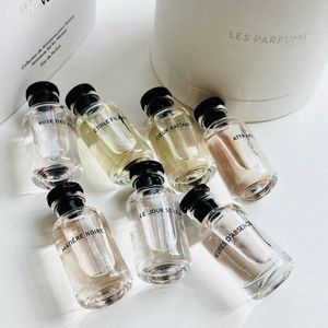 wholesale Perfume Set 10ml 7pcs rosa / etoile filante / cceur battant / attrape-reves / matiere noire / le jour se leve / heures d'absence con caja de regalo Envío rápido duradero