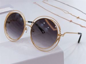 Gros-motif en spirale rond cadre rétro nouvelles lunettes de soleil de designer populaires protection de la couleur de la lumière verres décoratifs de qualité supérieure 114s