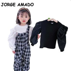 Venta al por mayor, camiseta de primavera para niña, manga larga abullonada, algodón de Color sólido, estilo fino de moda de Corea, ropa para niños E3018 210610