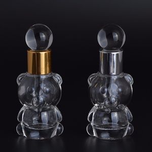 wholesale Elegante transparente pequeño oso 8 ml botella de vidrio gota encantadoras botellas de perfume vacías con tapa de aluminio