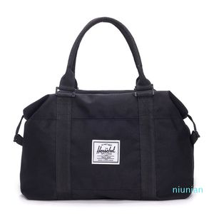 Venta al por mayor- Bolsa de viaje Gran capacidad Hombres Equipaje de mano Bolsas de lona de viaje Bolsas de fin de semana de nylon Mujeres multifuncionales