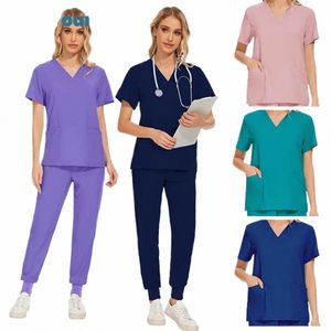 Venta al por mayor Las mujeres usan trajes de exfoliación Hospital Médico Uniforme de trabajo Médico Quirúrgico Multicolor Uniforme unisex Enfermera Accories P3zQ #