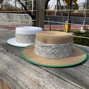 Chapeaux larges chapeaux seau designer nouveau parasol de la famille Luo chapeau haut de forme pour les femmes été plage spectacle visage petit écran solaire couleur unie bord Sun Tide 0VSO