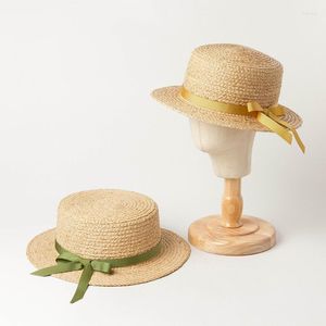 Sombreros de ala ancha X241 Bow Ribbon Lafite Flat-top Hat para turismo infantil Sun-shading Beach Straw Kids Sun Cap Kids