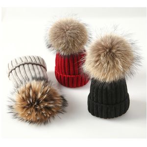 Hiver femmes bonnet tricoté véritable fourrure de raton laveur pompon chapeau pour femme enfants chaud épais épais chapeaux extensibles