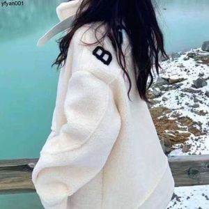 Chaquetas de invierno para mujer Chaqueta de diseñador Abrigos de lana blanca Zip Cardigan Parka Pareja Ropa de abrigo
