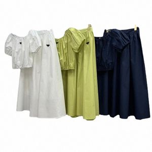 diseñador de las mujeres temperamento francés vestido de cuello de una línea Trajes casuales de las mujeres Marcas de moda de verano Tops para mujer Falda a juego de cintura ajustada dos v1W4 #