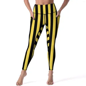 Leggings pour femmes rayé vertical sexy noir et jaune pantalon de yoga de gymnastique taille haute collants de sport extensible avec poches mignon leggins personnalisés