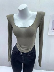 Camisetas para mujer, venta al por mayor, camisetas transparentes ajustadas sexis para mujer, camisa sólida ajustada de manga larga con cuello en U bajo y estiramiento alto para primavera