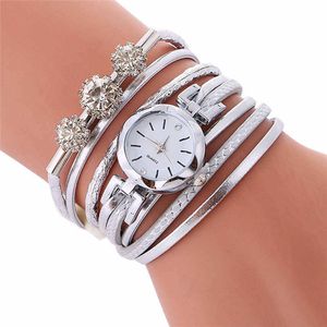 Relojes de mujer Los más vendidos Personalidad con incrustaciones de diamantes que dan vueltas alrededor de la pulsera Reloj Montre Femme Acier Inoxydable @ 50 H1012