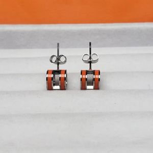 Pendientes de tuerca para mujer, temperamento esmaltado de diseñador, pendientes simples diarios que combinan con todo, color negro, blanco, rojo, naranja, regalo de joyería de boda