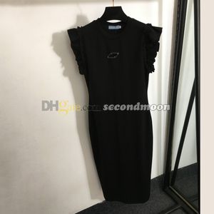 Robe moulante sexy pour femmes, dos nu, avec badge en métal de styliste, robes fendues à la mode