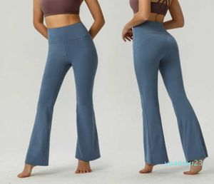Pantalons de yoga pour femmes Couleur unie Nude Sports Façonner la taille Tight Flared Fitness Loose Jogging Sportswear Womens Nine Point Flared Pant