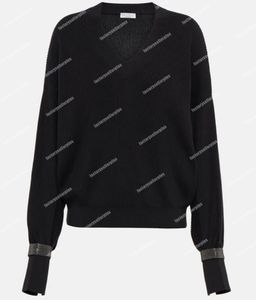 Suéteres para mujer Camisa Brunello Suéter negro de algodón con cuello en V y remaches en los puños