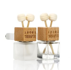 Clips d'évent de voiture en bois 8ML Bouteille de parfum Rétroviseur Suspendu Ornement Cube Parfums Bouteilles vides Parfum d'air Diffuseur d'huiles essentielles SN2670