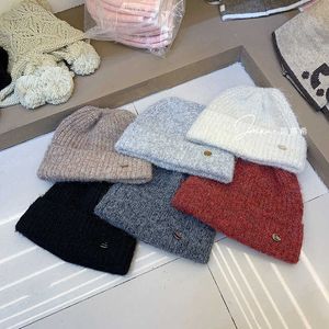 Chapeau de fil mélangé en laine lâche et chaud à l'automne et à l'hiver Empiler le chapeau froid Big Head Enrouler pour montrer un petit chapeau de protection de l'oreille en tricot