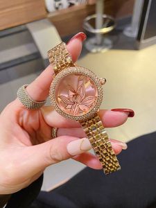 Montres-bracelets pour 2023 Nouvelles montres pour femmes Trois points 33mm Montre à quartz Top Marque de luxe Ceinture en acier diamant dame accessoires Forme ronde Mode SWA