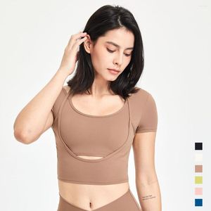 Traje de yoga Mujeres Deportes Sujetador Crop Tops Fitness Chicas jóvenes usan ropa interior de gimnasio de manga corta Entrenamiento de sentido desnudo