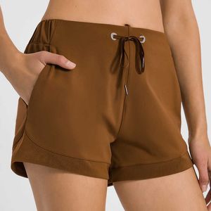 Short de Yoga avec cordon de serrage, taille élastique avec poche, sous-vêtements de sport, de course, de Fitness, vêtements de sport pour femmes, couleur unie, Leggings chauds