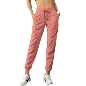 Leggings Yogaworld pantalones de yoga sexy Pantalones de chándal para mujer Pantalones de fitness para correr delgados y sueltos con bolsillos de 9 puntos para corredores casuales para ataduras de pies