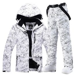 -30 warme mannen dames sneeuwpak dragen snowboard kleding sets winter buiten sport waterdichte kostuum ski -jassen en riembroek 231221