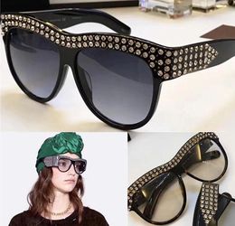 - Vente de lunettes de soleil 0147s avec monture en diamants brillants, protection populaire, qualité supérieure, mode été, style pour femmes.